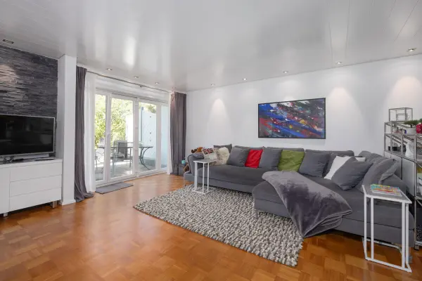 Wohnbereich EG der Immobilie: Familienfreundliches Reihenmittelhaus mit  Einliegerbereich und Garage (Foto)