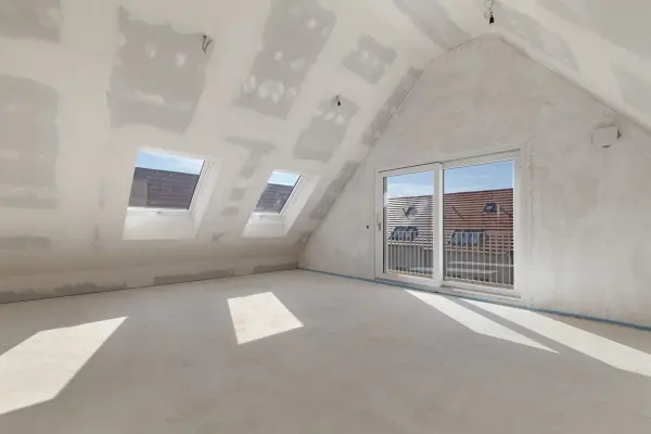 Wohn-und Esszimmer mit Zugang zum Balkon Einheit Nr. 3